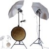 photographic umbrella with light stands and studio reflector discs.