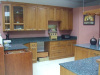 Solid Wooden Cabinetary with Black Granite Tops