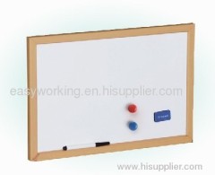 white board with wood frame