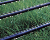 Drip irrigation belt with column dripper