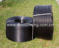 Drip irrigation pipe with round dripper