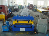 Colored steel arc plate forming machine