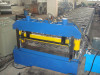 Colored roof panel forming machine