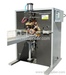 Four-point positioning cage top welding machine
