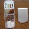 Compact mirror with sewing kit