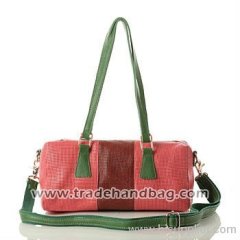 Perforated mixed-color leather handbag wholesale