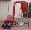 Blower style hammer mill