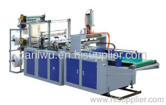 SHXJ-C700 full automatic T-shirt hot sealing cold cutting bag making machine