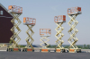 Engine powered cross country type scissor lifts