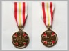 metal medal with ribbon