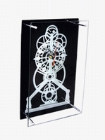 glass wall clock with white toothed wheel