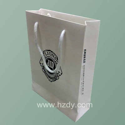 White paper bag with white cotton rope