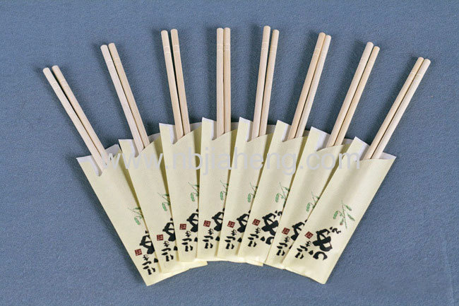 Natural bamboo chopsticks wrapped with open paper bag