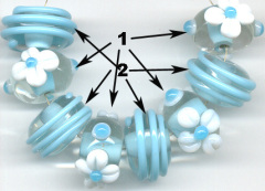 transparent and baby blue rondelle lampwork banded beads
