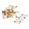 gold color common safety pin