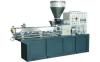 Plastic products extruding machine