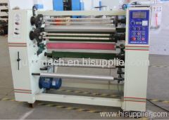 Stationary tape slitting machine