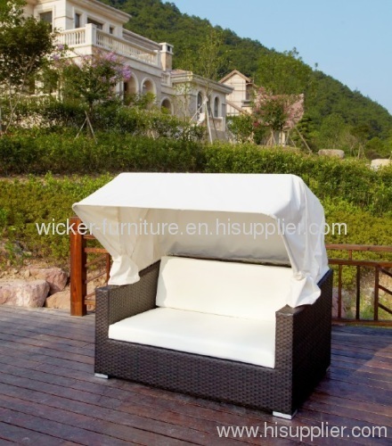 Garden chaise lounge with footrest and roof