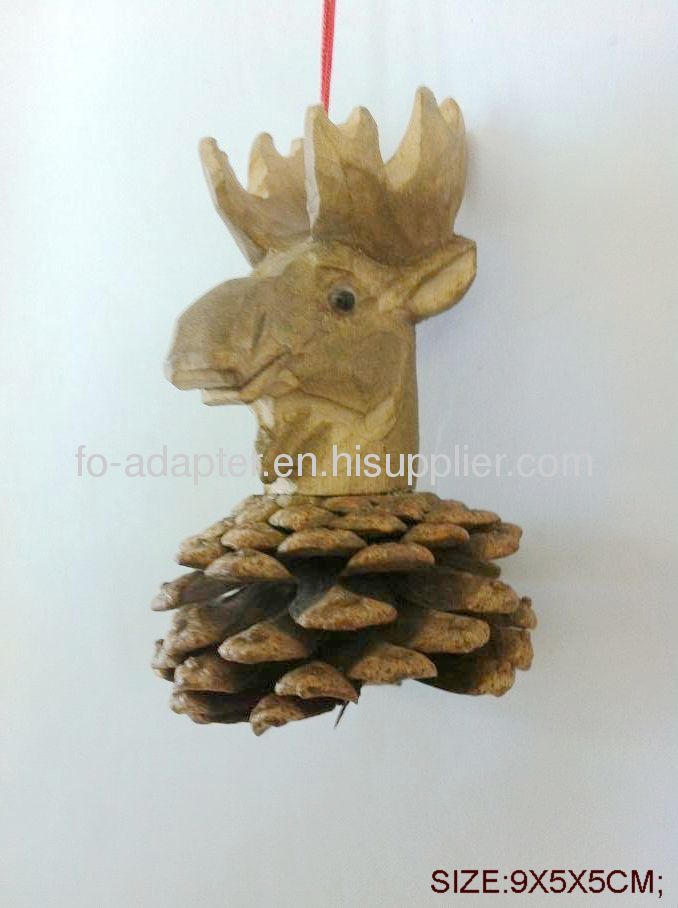 Hand carved wooden animalhead on pine cone