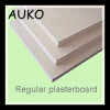 Perforated gypsum plasterboard manufacture