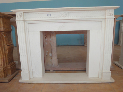 simple white marble fireplace mantel