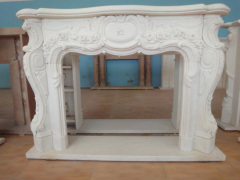 carved flowery fireplace frame