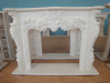 flowery carved marble mantelpiece