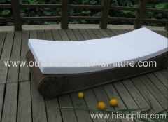 Outdoor patio wicker lounge with waterproof cushions