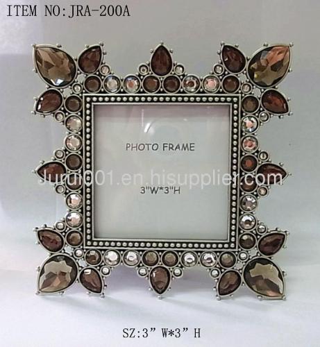 Metal photo frame with epoxy and crystals