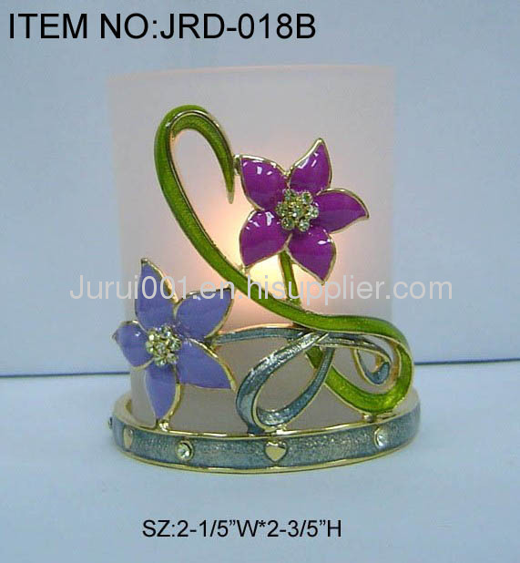 Metal candle holder with colorful flowers