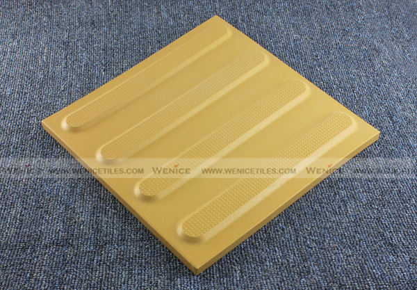 Yellow stripe line type tile for train station