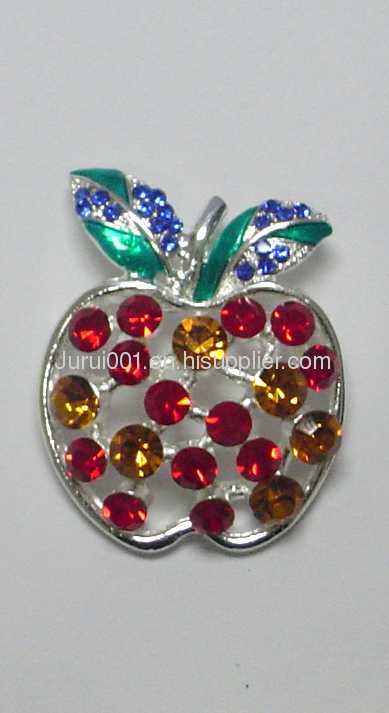 Metal brooch with flowers and crystals