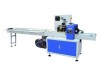 Merchandise pillow packaging machine