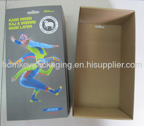 Corrugated folding box with slider