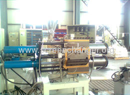 Continuous hydraulic double piston screen changer