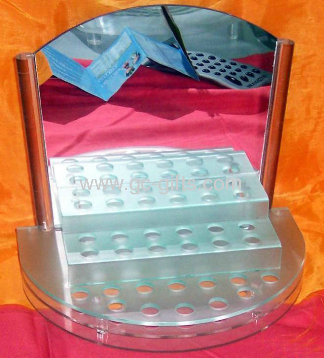 A silver mirror of acrylic cosmetic display lipstick