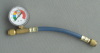 Refrigeration hoses with gauge