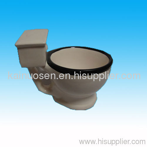 White ceramic toilet mug