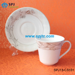 silver designporcelain coffee cup and saucer