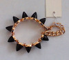 spiked casting charm bracelet