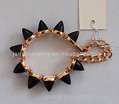 spiked casting charm bracelet