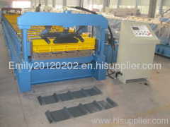 Roof panel roll forming machine