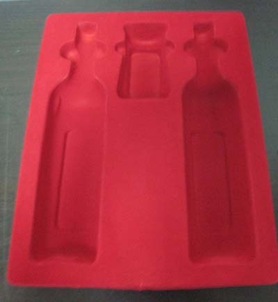 Plastic flocking blister packaging tray for bottled wine