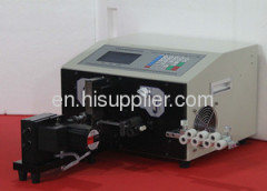 Wire cutting and stripping machine