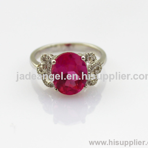 White Gold Plated Sterling Silver with 8x10mm Oval Created Ruby and Clear Cubic Zircon Ring