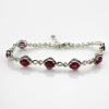 Sterling Silver Link Bracelet with 5x7mm Created Ruby Stones