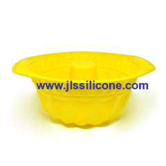 bright yellow silicone bundt cake baking pans with holder