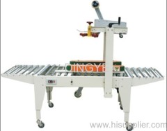 FXJ5050B CARTON SEALING MACHINE (side belt conveyor)