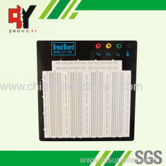 large white breadboard with black plate