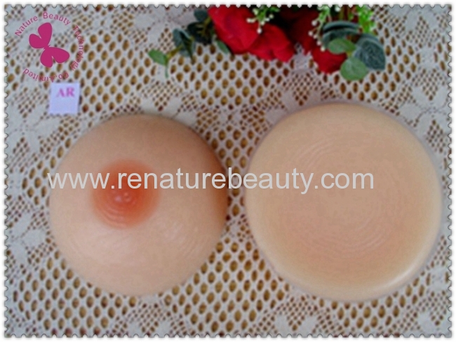 Round shaped silicone artificial breast for men